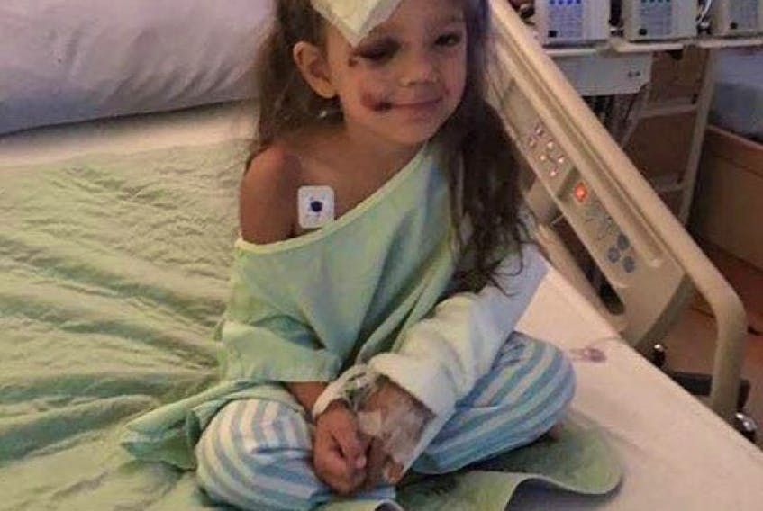 Brielle Marsman, 3, is lucky to survive a two-storey fall from the window of her uncle’s house in Calgary.