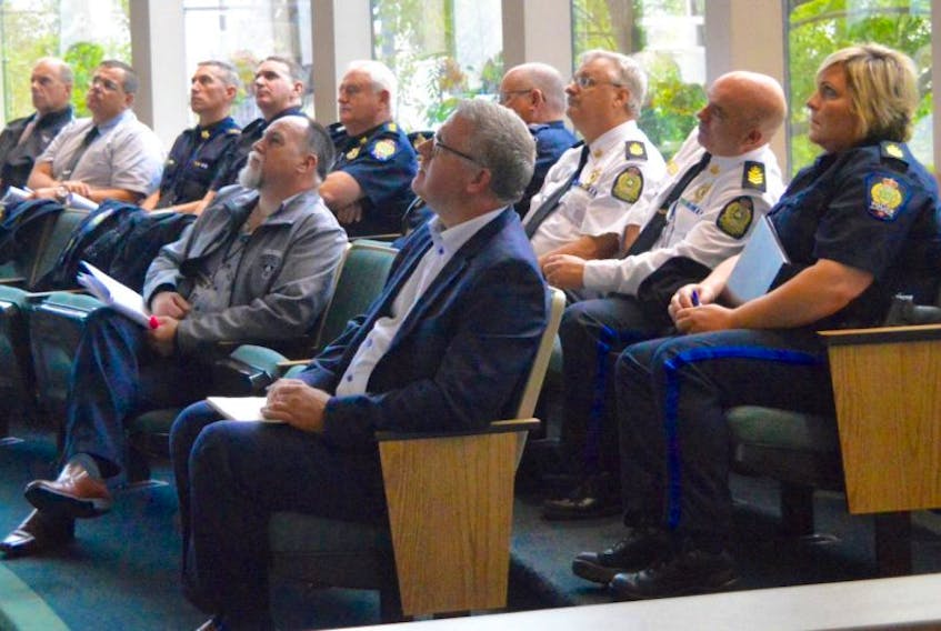 CBRM Deputy Mayor Eldon MacDonald and Mayor Cecil Clarke, pictured in the front row, were joined by some of the municipality’s most senior police officers at Tuesday’s police commission meeting in the Sydney council chambers. Chief Peter McIsaac presented statistics that indicate Cape Breton crime is on the decline.