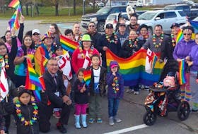 Leslie Labobe takes a picture with people who walked during last year’s Eskasoni Pride Parade. Eskasoni is the first indigenous community in the Atlantic provinces to host a Pride week.