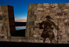A re-enactor’s shadow is seen on a stone wall at the Fortress of Louisbourg. The reconstructed 18th-century French fortress is the most haunted place in Cape Breton, according to local paranormal investigator Doug Mombourquette of Haunts from the Cape. Contributed/Fortress of Louisbourg National Historic Site