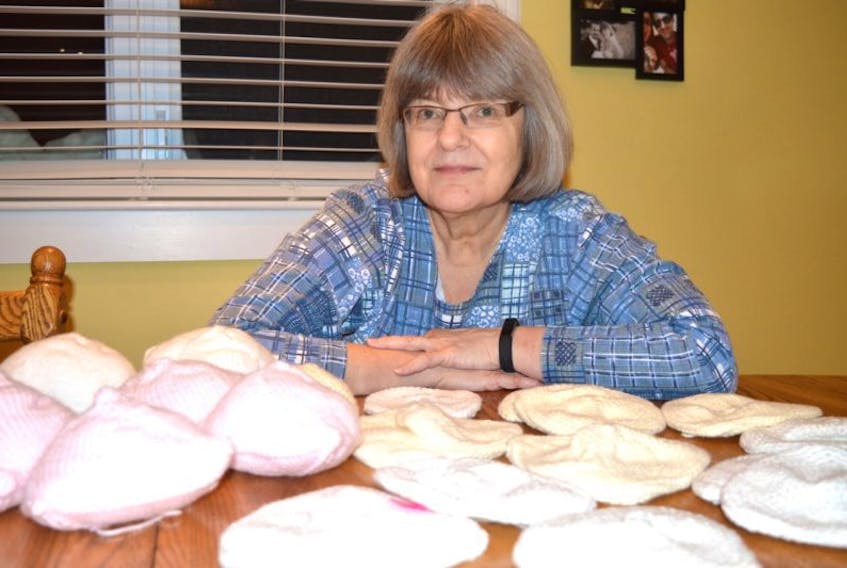 Joan Chiasson-MacDonald of New Waterford, a member of the Island Breast Friends, shows knitted knockers which are distributed to breast cancer survivors. Chiasson-MacDonald said an appeal for knitters to make the knockers was a success.