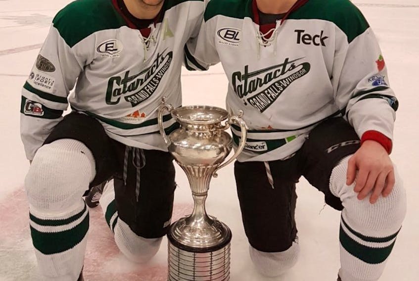 From left, Ryan Desrosiers of New Waterford and Stuart MacRae of Coxheath are shown after winning the 2017 Allan Cup senior men’s national hockey championship with the Grand Falls-Windsor Cataracts on Saturday in Bouctouche, N.B.