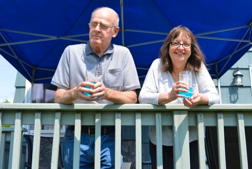 Cecil Saccary and his wife Rita Saccary relax on the deck of their home in Glace Bay. The Saccarys, who managed the Glace Bay Shoe Store for 17 years, have retired and the storeowners have closed the downtown business.