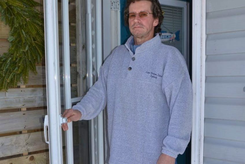 Joe Yorke stands in the doorway where in May 2016 he was attacked by an individual who punched him in the face.