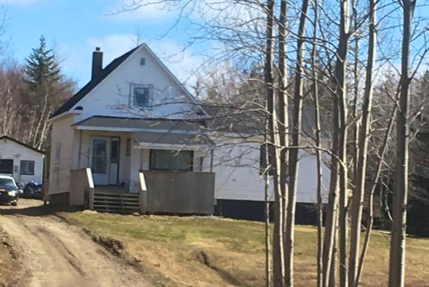 A man was arrested at this home on O'Brien Street in Gardiner Mines at noontime Tuesday. A woman was found dead in the home when Cape Breton Regional Police brought the man into custody.