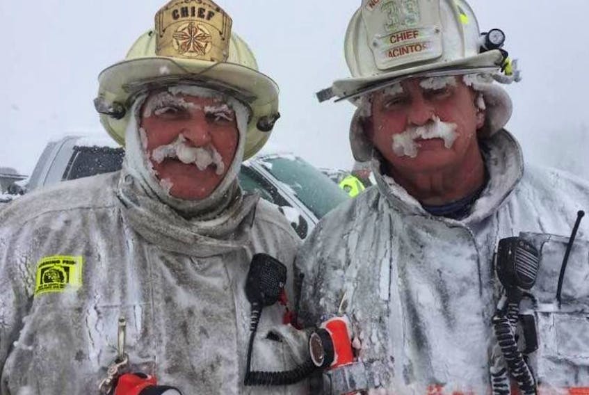 These local firefighter chiefs know what winter is all about. Sydney River’s Dave Witzell, left, and North Sydney’s Lloyd MacIntosh proudly show off their ice moustaches during the recent cold snap.