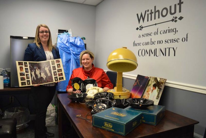 Staff member Lauren Hall and Terri Dennis, executive director of the Northside Harbourview Hospital Foundation, are collecting memorabilia to have on hand during the Mom Prom which will take place Saturday, April 29 in North Sydney.