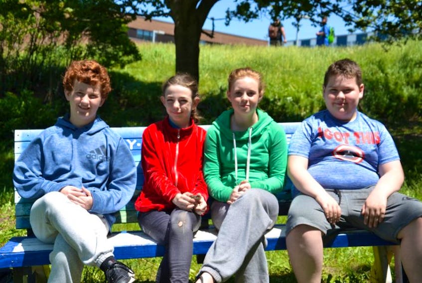 From left, Robbie Hussey, 14, and Katie McPherson, Chelsey Sparrow and Avrey Hillier, all 12, want other youth to know if you are being bullied, talk to someone you trust and get help.