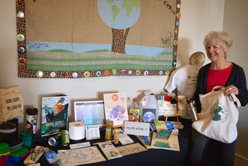 Elke Ibrahim, vice chair of the Glace Bay Heritage Museum Society and curator of the Old Town Hall museum, shows examples of changes people can make to live a more environmentally friendly life. Ibrahim said today is Earth Day and this display will be up at the museum for the next month.