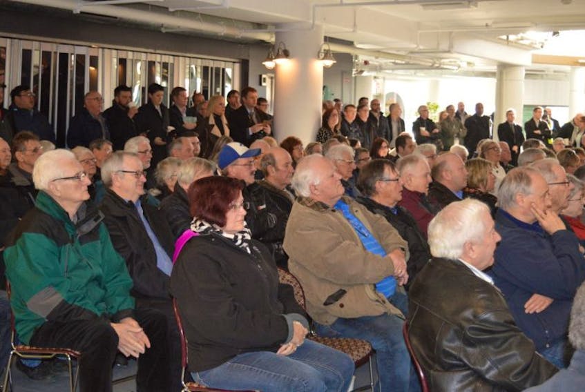 Interested onlookers, municipal officials and local business people crowded into the Joan Harriss Cruise Pavilion in Sydney Monday as the long-anticipated announcement of federal and provincial dollars for a second cruise ship berth for the port of Sydney was announced.