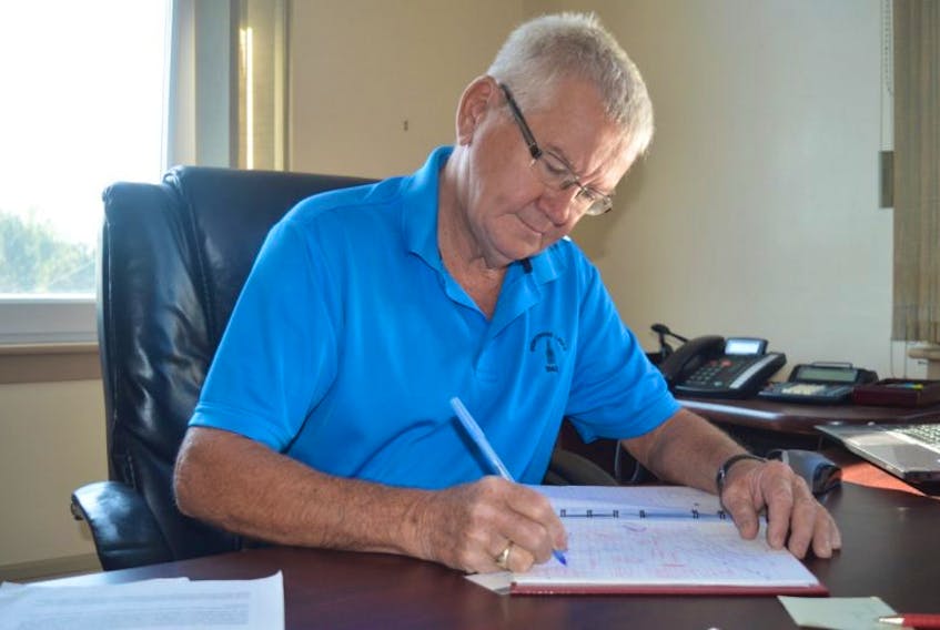 Sandy Hudson is shown working in his office at the Baddeck Courthouse on Thursday. Hudson, who’s been the CAO of Victoria County for the past 15 years, announced his retirement in July. His official last day is Oct. 15.
