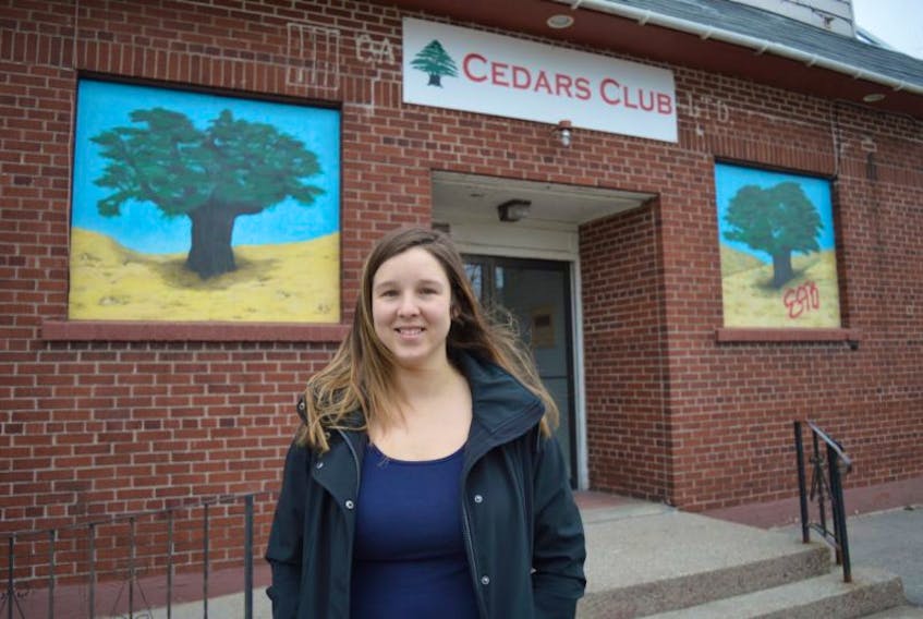 Becky Chisholm, president of the St. Joseph’s Lebanese and Syrian Benevolent Society, stands in front of the Cedars Club in Sydney. The club, which applied for disaster financial assistance after the Thanksgiving Day flood, was recently approved for disaster relief funding from the province.
