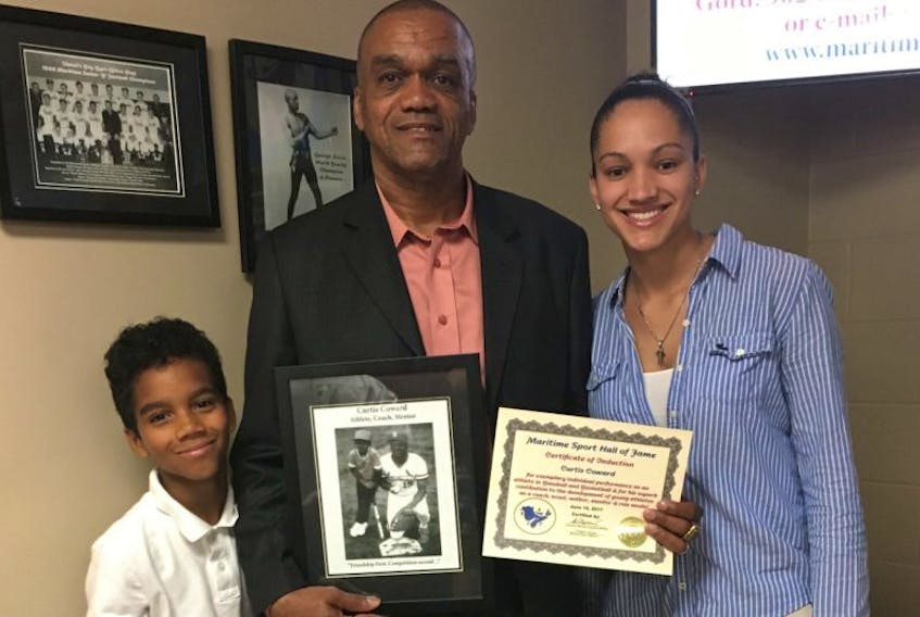 Curtis Coward, originally of Whitney Pier, is shown with his son, Deion, and daughter, Rachelle, after being inducted into the Maritime Sport Hall of Fame in Bedford on June 14.