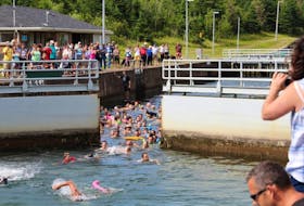 In this file photo, people came from near and far for the Swim the Canal event in St. Peter’s during Nicolas Denys Days last summer.