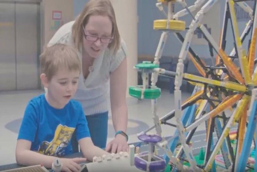 Anne Luker of Sydney Mines is seen here with her son Mason. Luker had her wish for an interactive Lego city to entertain children at the Cape Breton Regional Hospital come true when it was chosen by BMO Financial Group.