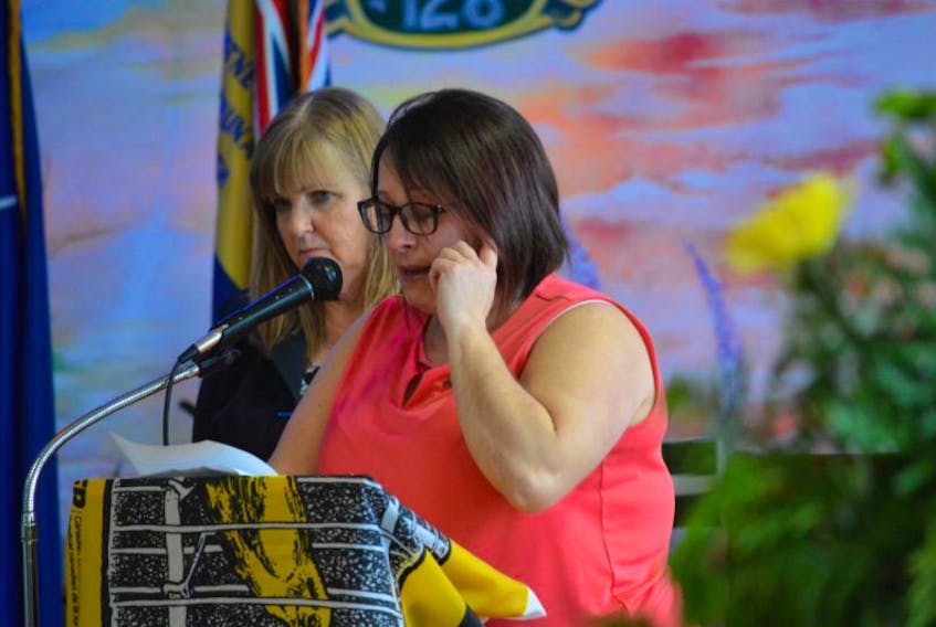 Lisa Benoit fights back tears as she talks about her late father, Bennie Benoit, during the Day of Mourning commemoration at branch 128 Royal Canadian Legion in Whitney Pier on Friday. Her father was among the 26 men killed in the Westray Mine disaster in 1992.