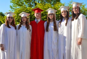 Riverview honour students, from left, Lauren Attwood, Sara Bennett, Connor Poirier, Breanna MacMillan, Cole Smolensky and Katelyn Libbus pose in front of their school before graduation ceremonies on Thursday evening.