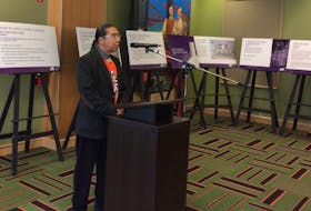 Stephen Augustine, associate vice president of Indigenous Affairs and the Unama'ki College at Cape Breton University, opens the ceremony Friday morning in announcing the university's decision to build a legacy room to honour residential school survivors.