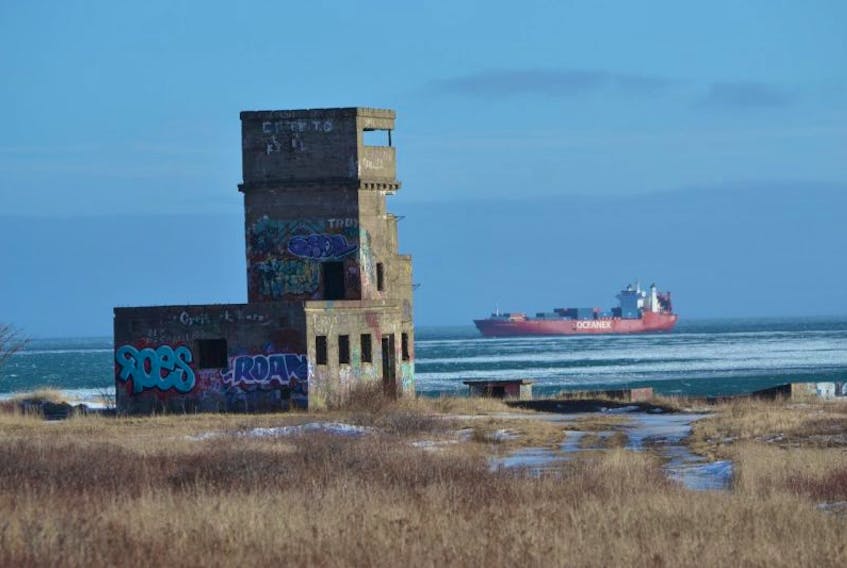 In this Cape Breton Post file photo from February 2015, a tanker passes by one of the fortifications at Chapel Point in Sydney Mines. The area is part of a proposed development called Atlantic Memorial Park.