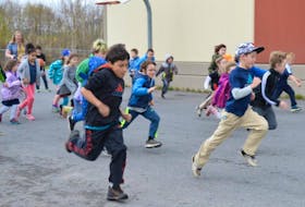 Above, a group of students from Shipyard Elementary raced around the school recently as part of the Kid’s Run Club program. They were preparing for this weekend’s Doctors Nova Scotia Youth Run in Sydney.