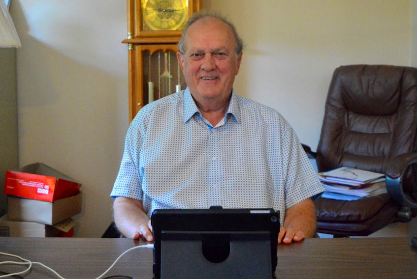 CBRM District 1 councillor Clarence Prince is seen working in the home office located at his Sydney Mines residence. The veteran elected representative has announced he will not seek re-election in the Oct. 17 municipal vote. DAVID JALA/CAPE BRETON POST