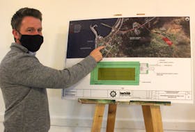 CBRM wastewater department manager Matt Viva points to a visual rendering of the sewage treatment plans for Port Morien. Chris Connors/Cape Breton Post 