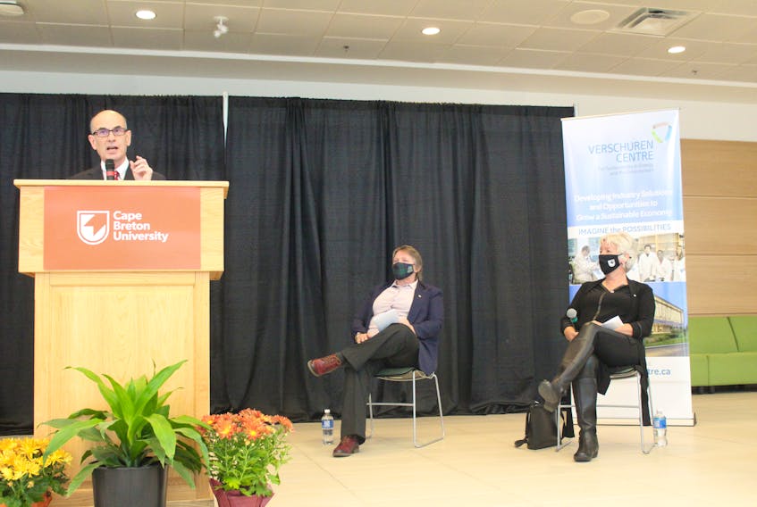 Cape Breton University president and vice-chancellor David Dingwall, from left, announces the incorporation of the Verschuren Centre for Sustainability in Energy and the Environment into a not-for-profit, stand-alone research and technology centre for commercialization of cutting-edge technologies and businesses on Wednesday. Looking on are Beth Mason, chief executive officer of the Verschuren Centre, and CBU chancellor and centre founder Annette Verschuren. Chris Connors/Cape Breton
