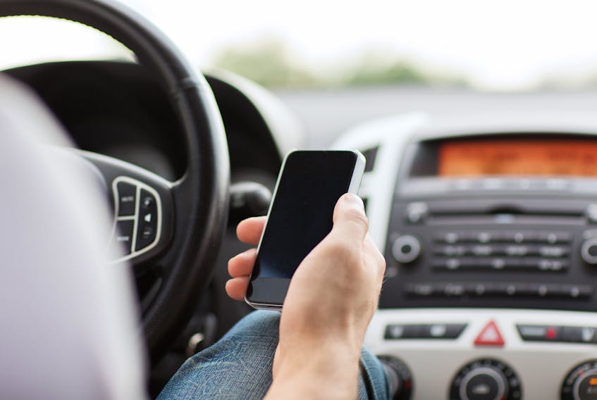 A new survey shows Canadians believe texting with cellphones is the distracted driving activity most likely to contribute to a traffic collision. 123RF STOCK PHOTO