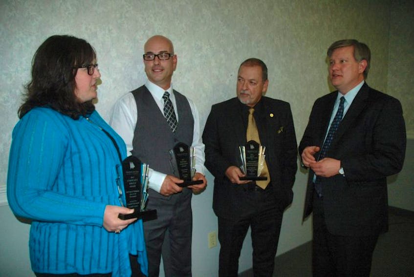 Three of this year's Yarmouth and Area Chamber of Commerce business award recipients (from left: Jodi Spicer-Outhouse, Greg Pottier and Keith Condon) chat with Richard Riley, U.S. consul general and guest speaker for the Nov. 13 business awards dinner.<br />ERIC BOURQUE PHOTO