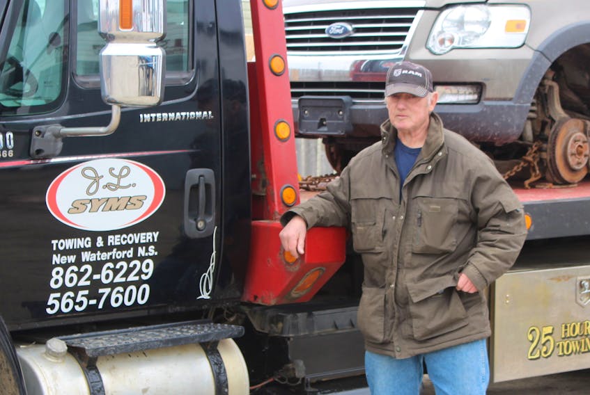 Louis Syms, of J L Syms Towing & Recovery in New Victoria, says he tows in vehicles whenever the police or municipality request his services. Syms says he already deals with high insurance rates for his vehicles. IAN NATHANSON/CAPE BRETON POST