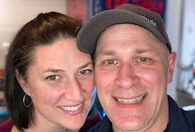 Amy Seymour, owner of Small Print Board Game Café, and her husband Chris smile in this photo she posted on Facebook to introduce herself to the wider Small Print community. 