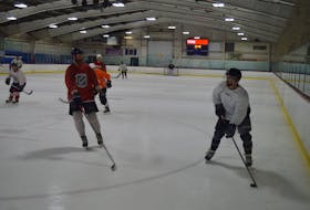 Players take part in a recreational hockey game at the Simmons Sport Centre in Charlottetown on Wednesday.