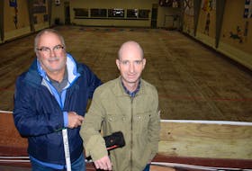 Charlottetown Curling Club president Tyler Harris, right, and director Colin MacAulay are disappointed there won’t be any curling in 2020 at the club due to a breakdown in the ice plant equipment.