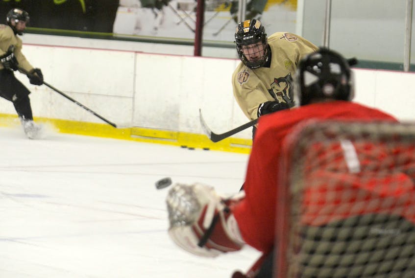 Charlottetown Bulk Carriers Knights' captain Max Chisholm fires a shot on goal during Tuesday's practice at MacLauchlan Arena.