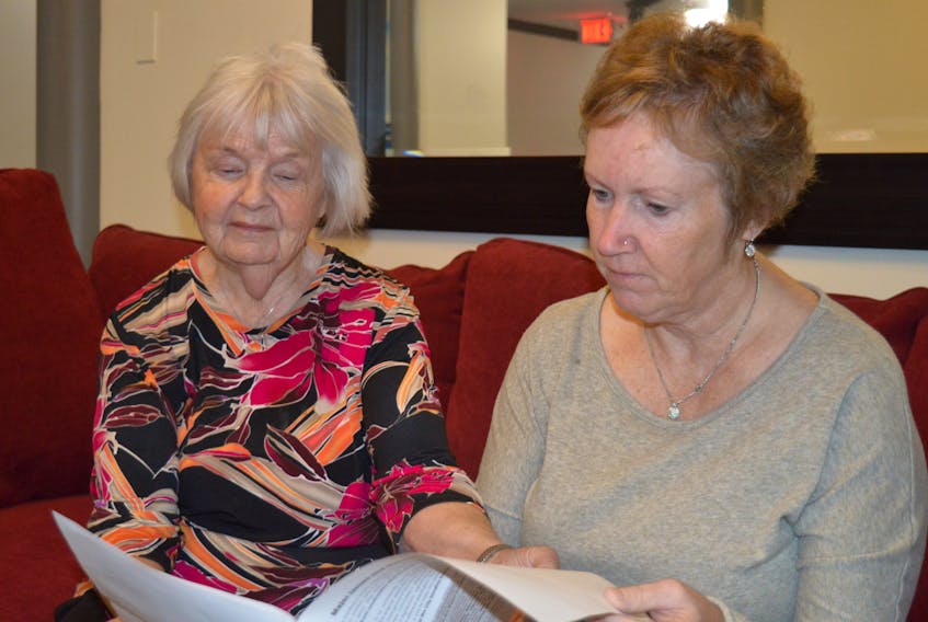 Arlene Mayme, left, and Louise Alders, residents of Renaissance Place on Haviland Street in Charlottetown, say an eight-storey, 99-unit apartment simply doesn’t fit between their building and the waterfront.