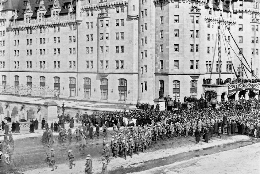 Troops massing in front of Chateau Laurier Hotel, Ottawa, during the Second World War. 