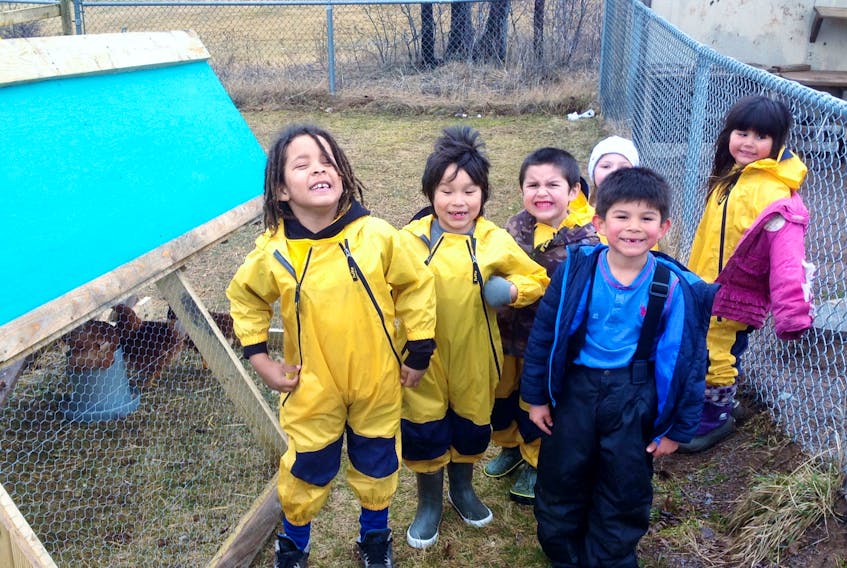 EAEC/A Grade Primary students pictured around the chicken coop are Zion Johnson (left), Wyatt Johnson, Jaxton Stevens, Jace Francis-Paulette, Allie Meagher (in back) and Phoenix Bernard.