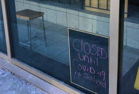 A sign in the window of Jumping Bean on Duckworth Street in St. John's is a variation on one of the many in local shops during the COVID-19 crisis. BARB SWEET/THETELEGRAM