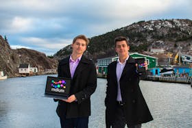 Austin Aitken, left, and Noah Côté are excited about their new startup company Mdium, which recently launched its beta website for transferring large files securely. — Contributed