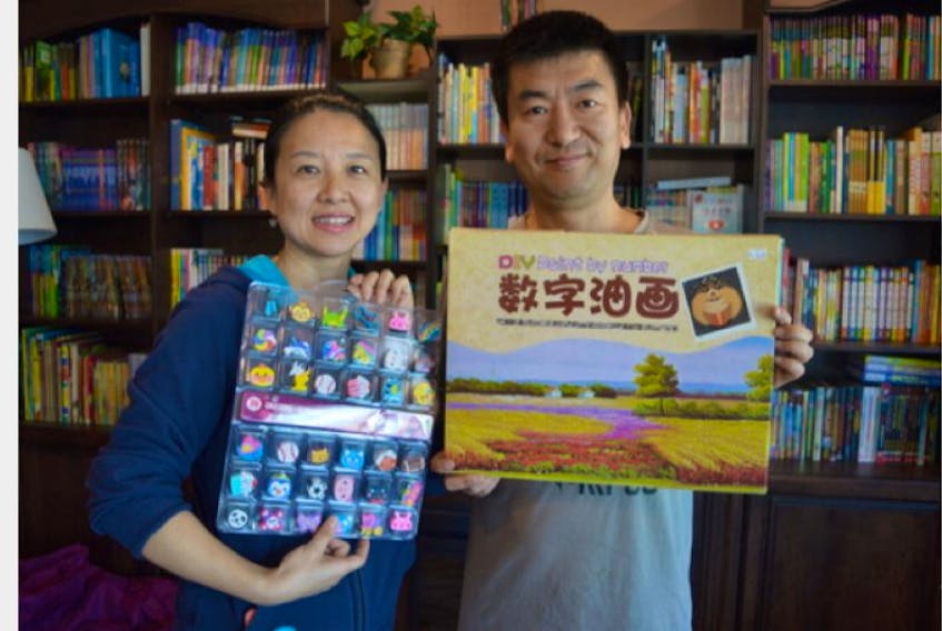 Tina Jiang, left, and Jun Jia are owners of the only Chinese children’s bookstore in Charlottetown called Little Maple Tree. The couple is hosting a yard sale and silent auction by the Chinese community at the Parish Family Center today.