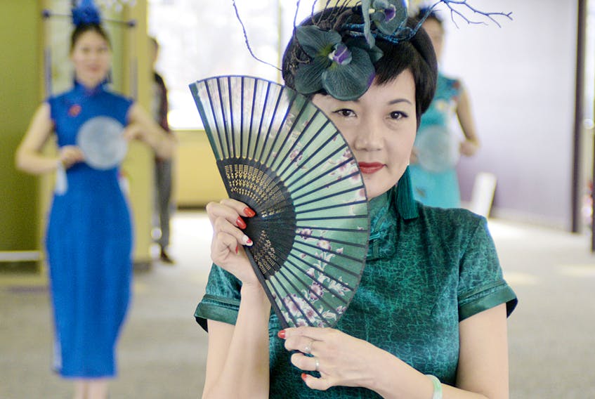 Yuanyuan rehearses a Chinese fan dance while preparing for P.E.I.’s first Chinese Chi-Pao Queen contest, which will be part of the Chinese New Year Celebration next Saturday at the Confederation Centre of the Arts. The contest will include fan dances, umbrella dances and lantern dances. MITCH MACDONALD/THE GUARDIAN