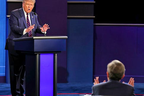 President Donald Trump argues with debate moderator Chris Wallace of Fox News Channel during the first 2020 presidential campaign debate, September 29, 2020.   