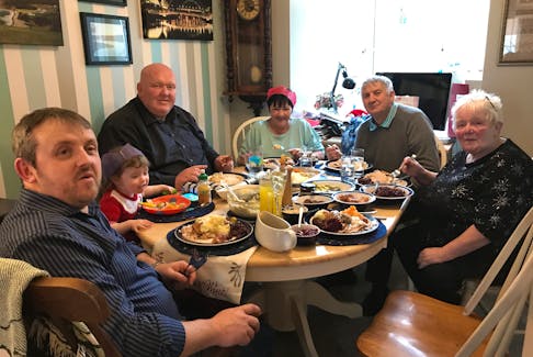 Glenn Ringer, front, sits at the head of the table during a Christmas dinner with his family in Consett County Durham in 2017. With him are, clockwise from Glenn, his daughter Eva, John Dunn, Jean Ringer, Keith Ringer and Marjorie Dunn. CONTRIBUTED 