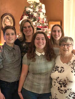 Claudette Cramm, right, stands with her daughter, Kimberley Studer, and her grandchildren, back row Séamus and Deirdre, and front row Aisling. 