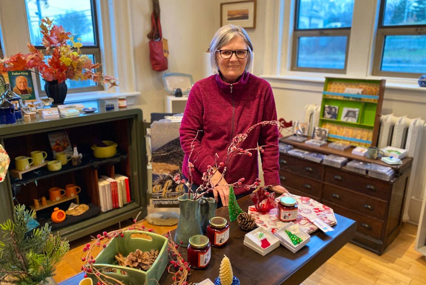 MaryAnn MacAdam, manager of the Isabelle Harris Gift Shop at Old Town Hall in Glace Bay, is surrounded by items available for purchase including Christmas jam which is made every year and sold to help raise money for the heritage building and its operations. Money is also being raised by selling tickets on a Christmas basket this holidays season. Valued at $250, tickets are available at the MacKeen Street location. The draw takes place Dec. 22 at 4 p.m. The gift shop, as well as the Glace Bay Heritage Museum, are open Tuesdays, Thursdays and Saturdays. CONTRIBUTED 