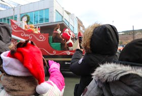 While details are yet to be announced, one thing is certain — crowds won’t be gathered tightly together like this in downtown St. John’s this year to see Santa Claus. — GLEN WHIFFEN/TELEGRAM FILE PHOTO