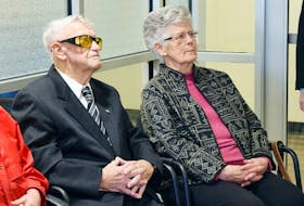 Two buildings in Bible Hill have been named in honour for former premier Roger Bacon and Ed Lorraine. Bacon listens to the ceremony with Shirley Lorraine, widow of the late Ed Lorraine.
