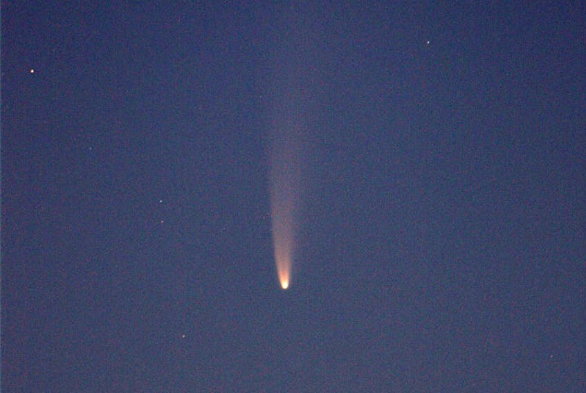 What a treat.  We didn’t have to get up early to see Comet NEOWISE, but Michael Boschat did.  This photo was one many he took between 3:30 and 4:30 Friday morning.  Amazingly he snapped these pictures out his front window, on the eighth floor of his apartment in Halifax.