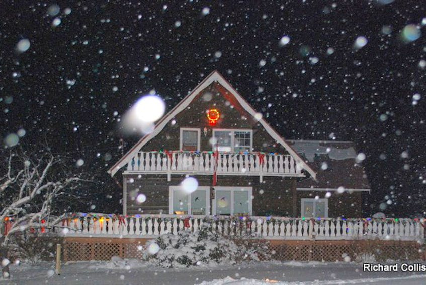 Richard Collis got his home on Boularderie Island NS ready for Christmas.. then Mother Nature supplied the snow!  Picture perfect!  Boularderie Island is an island separating the Cabot Strait from Bras D'Or Lake on Cape Breton Island.