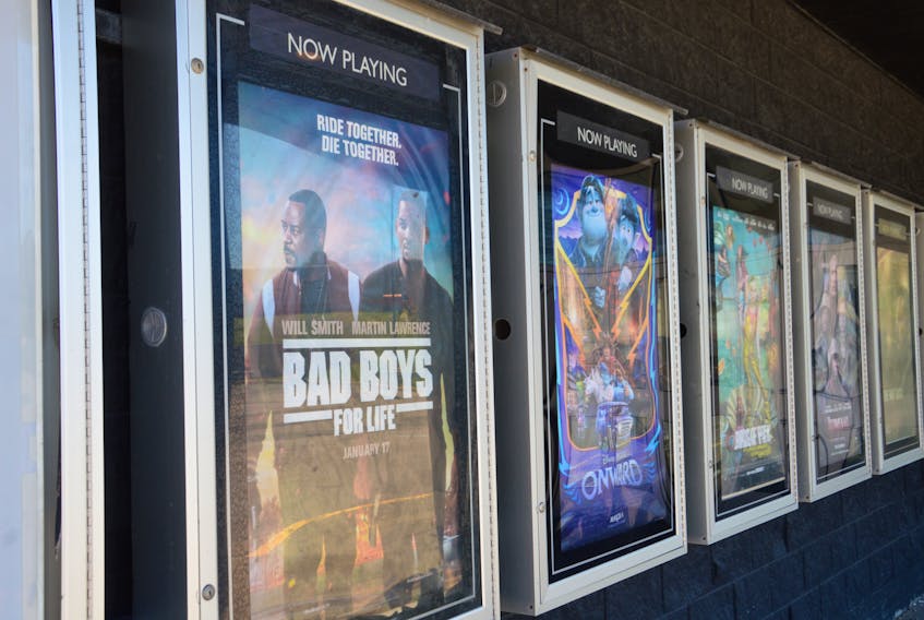 Movie posters outside of Cineplex Cinemas Sydney on Monday. The Prince Street location has been closed since March because of the COVID-19 outbreak. Many movie release dates have been delayed because of the virus as well. JEREMY FRASER/CAPE BRETON POST